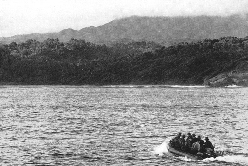 Spearhead of assault approaching Dominican beach at dawn in "Gemini" assault craft
