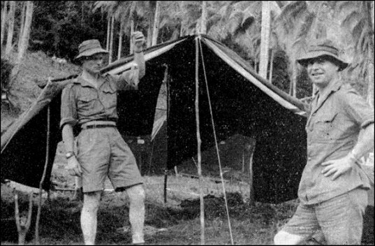 CSM Parker and RSM F. V. H. Lynch having locally caught crayfish for breakfast